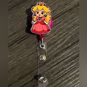 Princess Peach badge reel